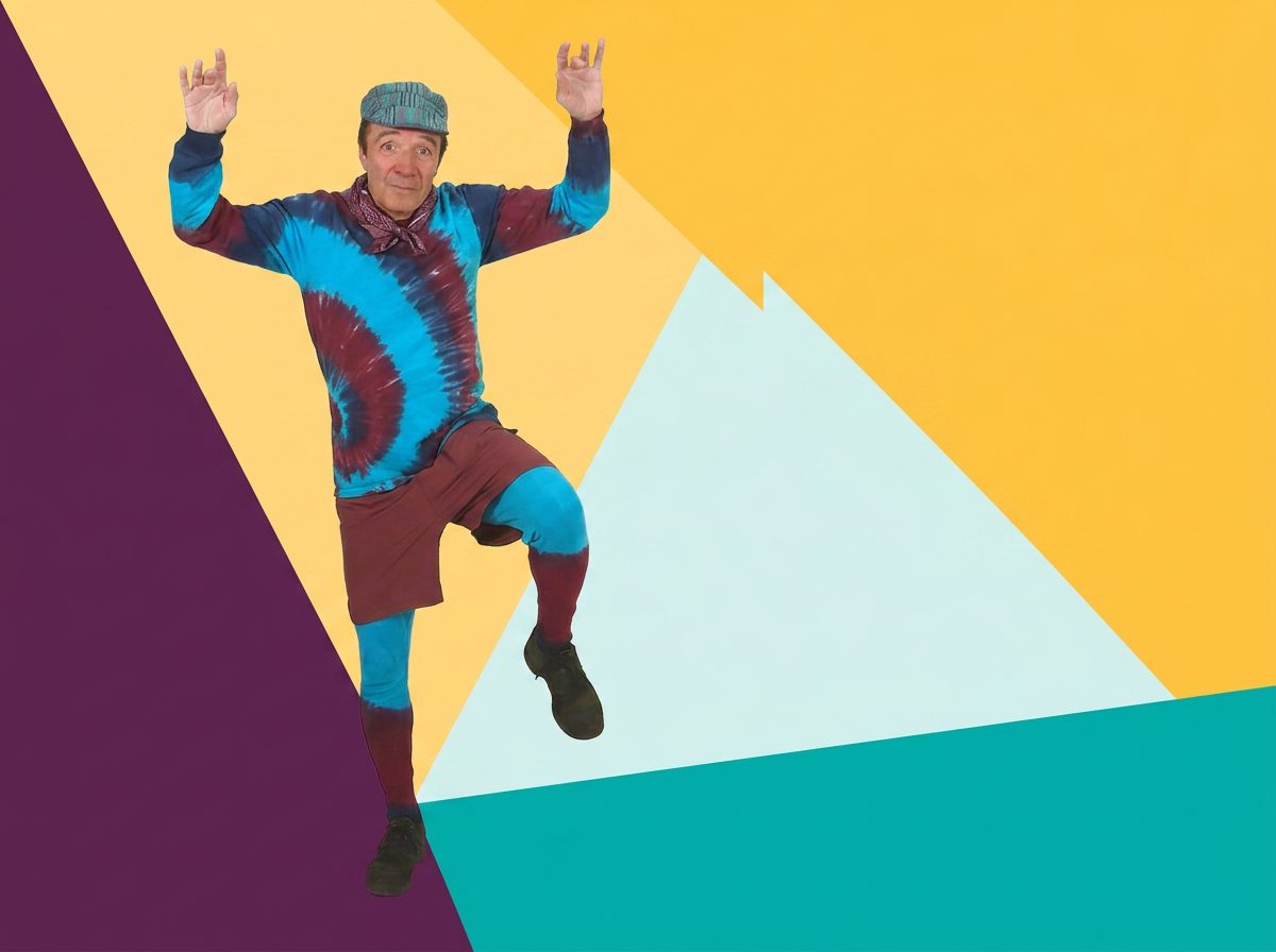 Scottee mid-jump during a Funsical class